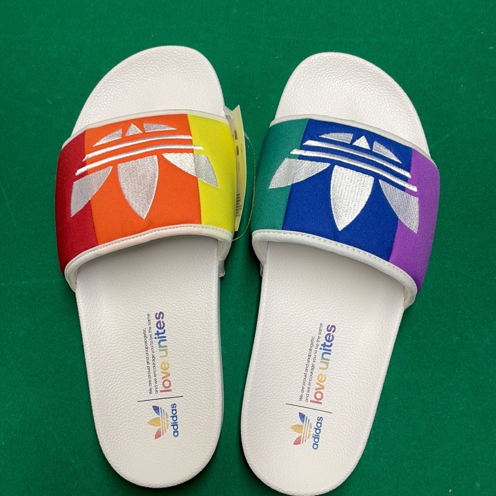 Men’s Adidas (love unites) slides. Size 11.